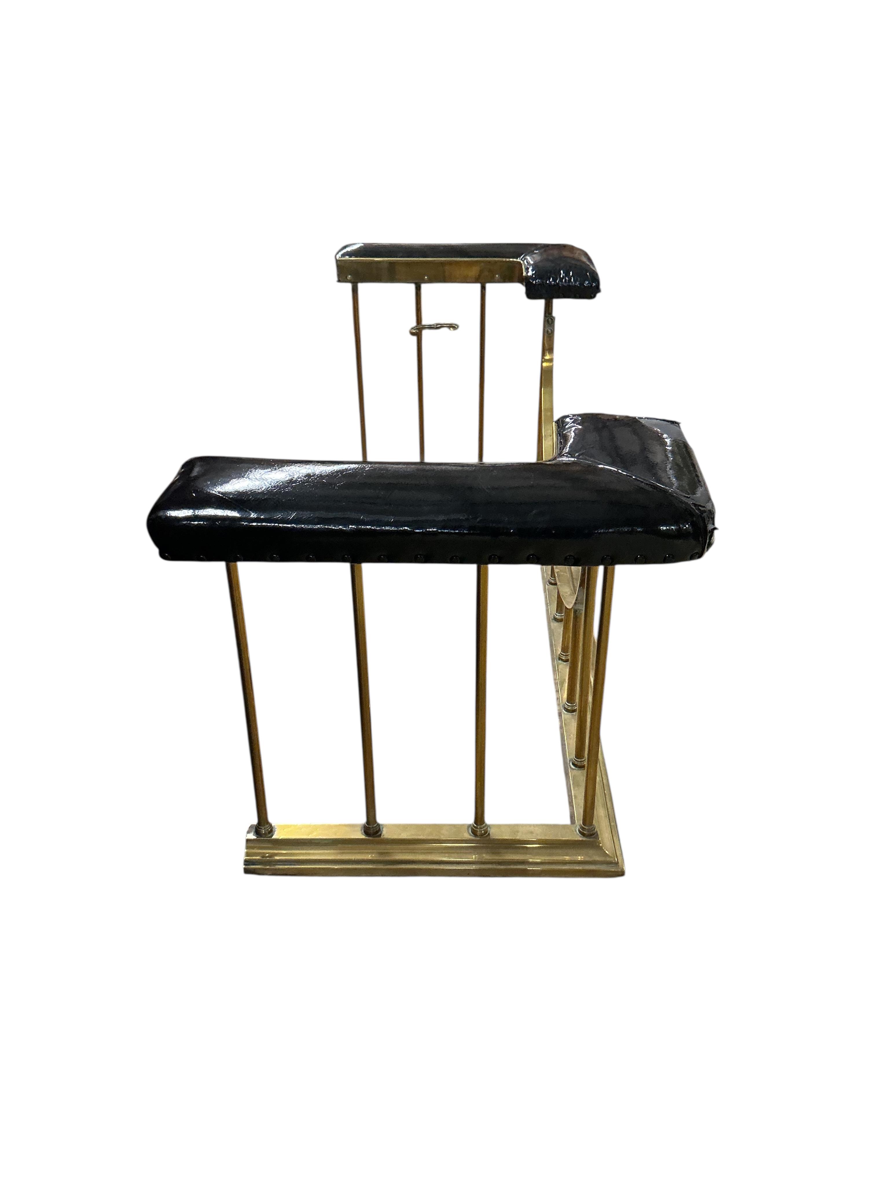 A late Victorian brass club fender, in need of re-upholstering, width 160cm, depth 60cm, height 59cm